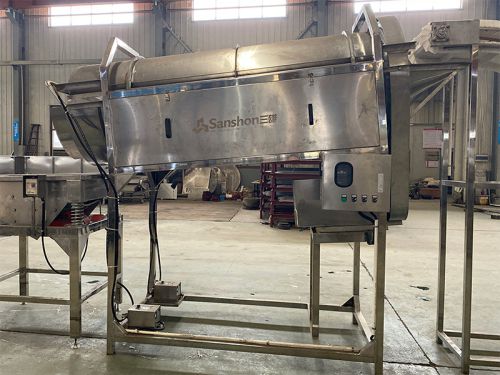 Prune coating machine